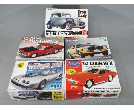 AMT, MPC, Revell, Lindberg, Monogram - Five boxed model kits in various scales. Lot includes Monogram 1970 Boss 302 Mustang; 