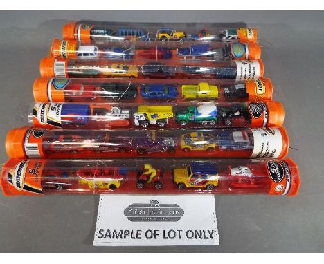 Matchbox Mattel Wheels - seven sealed tubes containing  five model motor vehicles, appear mint