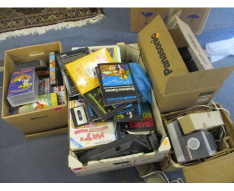 A mixed lot to include VHS tapes, Acornsoft games, an Aldis projector, Panasonic speakers and other items