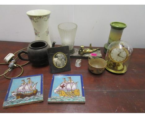 A miscellaneous lot to include a metal and marble, art deco style table lamp and a Kundo anniversary clock