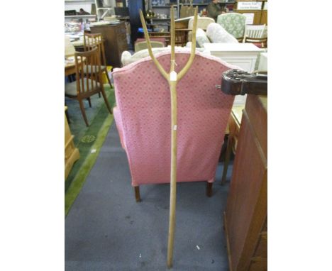 A continental wooden one piece pitch fork