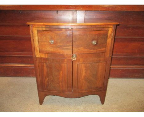 A Georgian mahogany inlaid twin door cabinet converted from a commode on bracket feet, 27 x 24 x 15