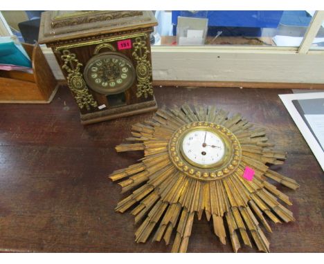 An early 20th century mixed wooden cased, bracket style mantle clock with brass spandrel mounts, the gilt dial with pierced f