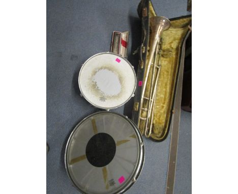 Musical instruments to include a Boosey and Hawkes Imperial, silver plated trombone, cased, a boxed Hohner Larry Adler Profes