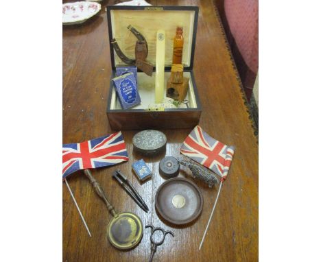 An interesting lot to include a nut cracker, a horseshoe, a puzzle box, playing cards, tape measures, cribbage boards, a penc