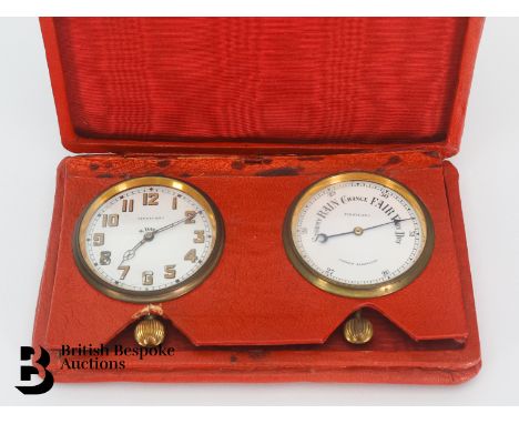 Finnigan's 8-day travelling clock and aneroid barometer, housed in a red leather case.&nbsp;