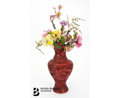 A Chinese cinnabar baluster vase, arranged with semi-precious and hard stone flowers and leaves, approx 42h x 24 w cms. (af)C