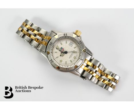 A lady's TAG Heuer stainless steel and gold plated Professional wrist watch. The watch case measuring 28mm, having a granite 