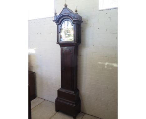 A mahogany 8 day striking long case clock, with a brass moon roller, 12 inch dial signed John Lacy, with repeat standing 98 i