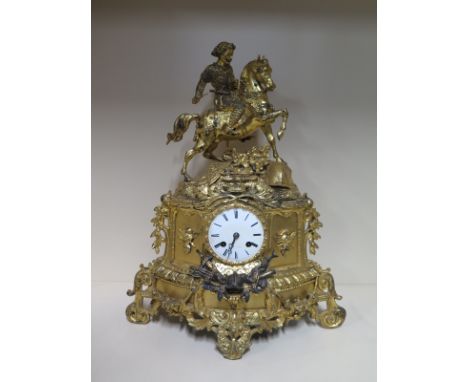 A French Foy of Paris ormulu mantle clock surmounted by a knight on horseback - 46cm tall, missing pendulum and bell loose 