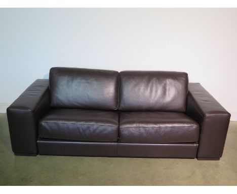 A Natuzzi brown leather sofa bed - 218cm W - in good condition 