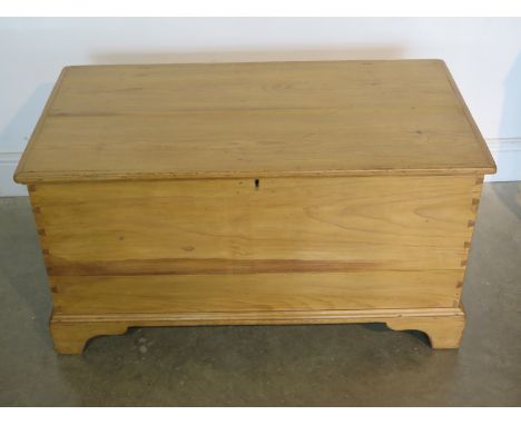An early 19th Century stripped pine blanket box mounted on bracket feet - in good waxed condition - 51cm H x 97cm x 52cm 