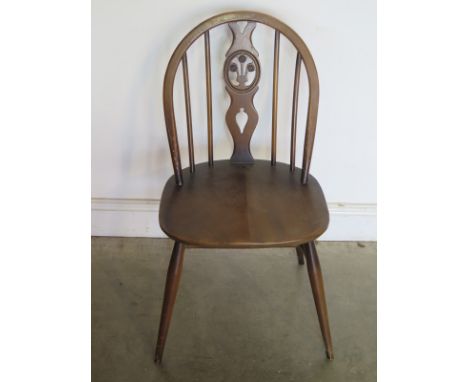 A single Ercol chair 