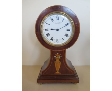 a mahogany case with boxwood inlaid balloon mantle clock, 8 day platform movement - approx 24cm H - in working condition 