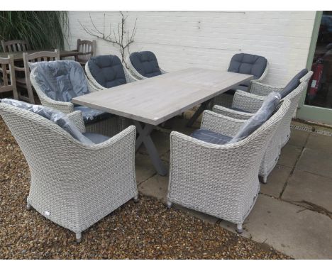 A Bramblecrest Monterey 215cm ceramic rectangle table and eight Monterey armchairs - RRP £2,801 