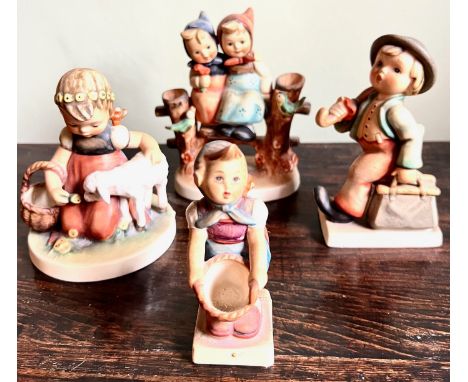 FOUR GOEBEL FIGURES. ALL IN USED CONDITION, UNCHECKED