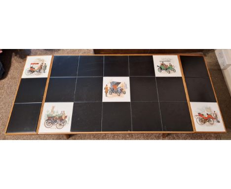 Decorative tile topped drop leaf coffee table. Approx. 39cm H x 111cm W x 47cm D

Reasonable used condition, scuffs and scrat