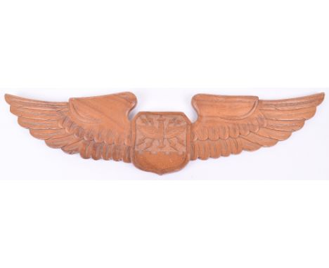 CARVED RELIEF PLAQUE OF USAF NAVIGATOR WING BADGE; super quality carved badge with 75 cm wing span with hanging ring to back.