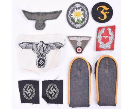 WW2 German Cloth Insignia, consisting of original combat tunic breast eagle, trade badge, Mountain Troops arm badge, Luftwaff