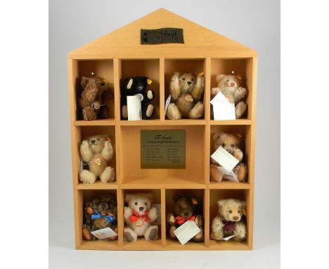 Steiff 029158 Decade Teddy Bear display set, wooden shelf set with ten seated bears representing different decades from 1902,