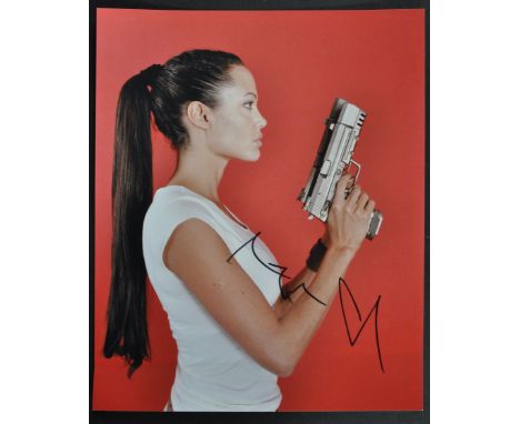 Angelina Jolie - American Actress - Tomb Raider - autographed colour 8x10" photograph of Jolie as Lara Croft. Neatly signed i