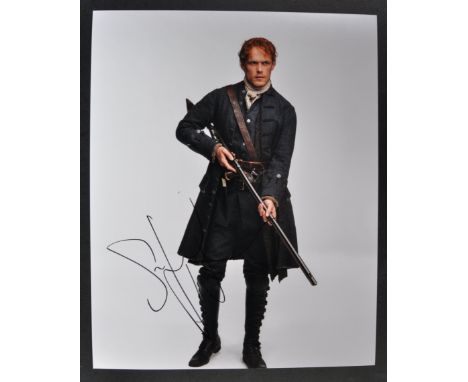 Outlander (TV Series) - Sam Heughan - autographed 8x10" colour photo from the series. Signed in black ink to a light area of 