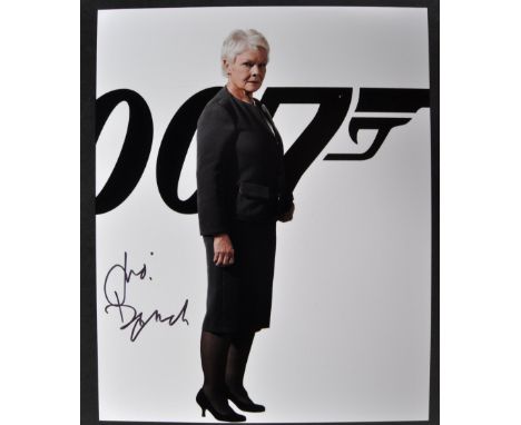 Dame Judi Dench - James Bond 007 - M - autographed 8x10" colour photograph from Skyfall. Signed neatly in black ink to a ligh