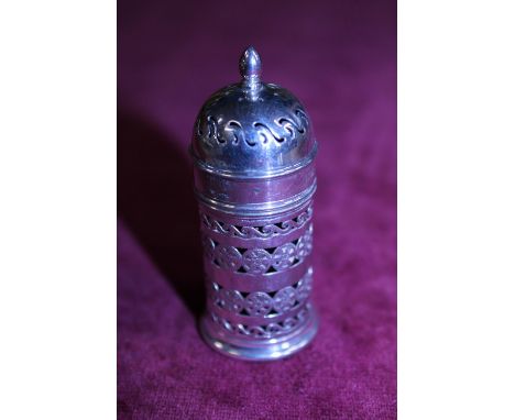 A vintage hallmarked silver pepperette with blue liner 
