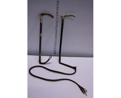 Two vintage riding crops one with silver mount 