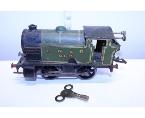 A vintage Hornby O gauge clockwork locomotive in working order with key 