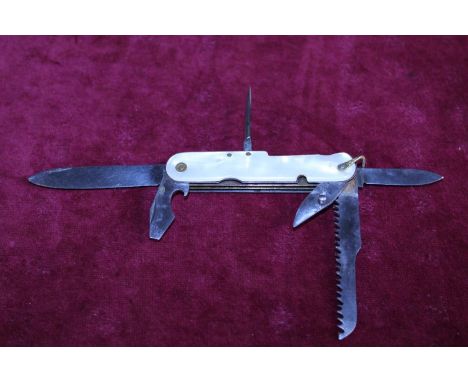 A vintage pen knife with MOP handle 