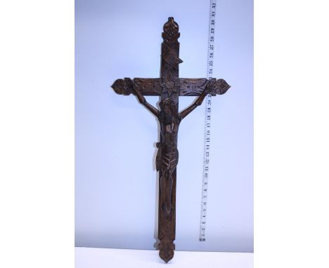 A large vintage wall hanging hand carved wooden crucifix. Postage unavailable 
