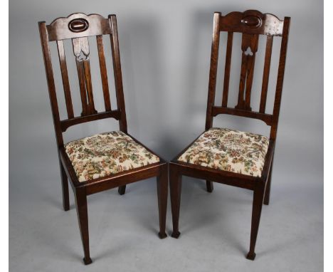 A Pair of Edwardian Oak Side Chairs with Tapestry Seats and Pierced Splats 