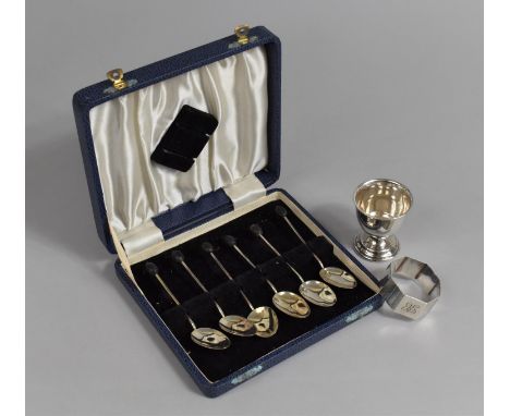 A Set of Six Silver Coffee Bean Spoons together with a Silver Napkin ring and an Egg Cup 