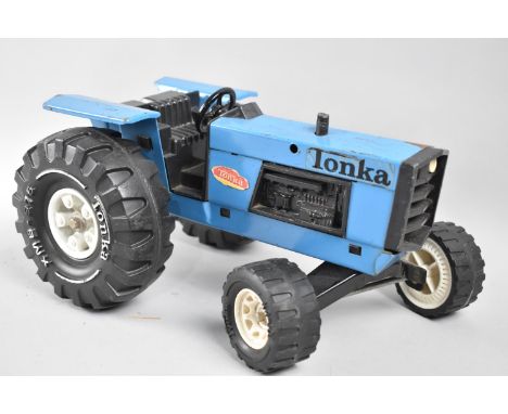 A Vintage Tin Plate Tonka Tractor, 26cm long 
