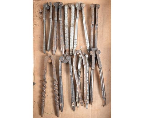 A Collection of Various Vintage Metal Nuctcrackers 