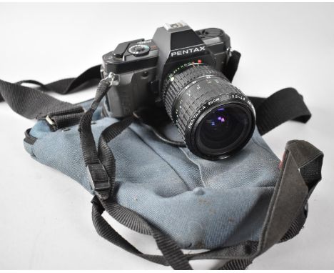 A Pentax P30N Camera with Pentax /A Zoom Lens and Canvas Carry bag 