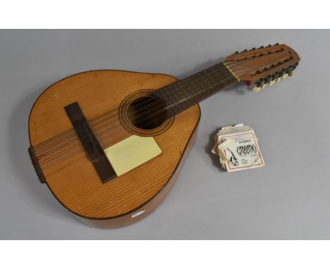 A Vintage Spanish Lute with Paper Label for Salvador Banez Hijos 