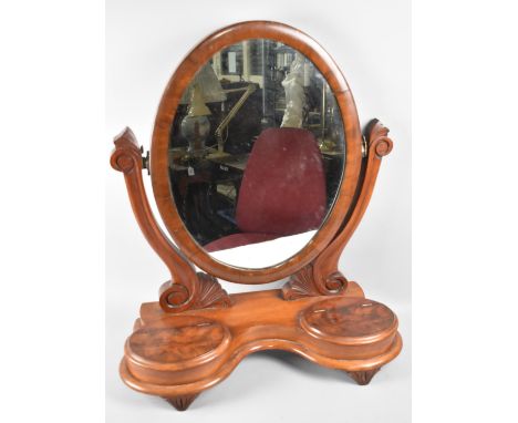 A Late Victorian Mahogany Oval Swing Dressing Table Mirror on Serpentine Plinth Base with Two Jewellery Wells, 65cm High 