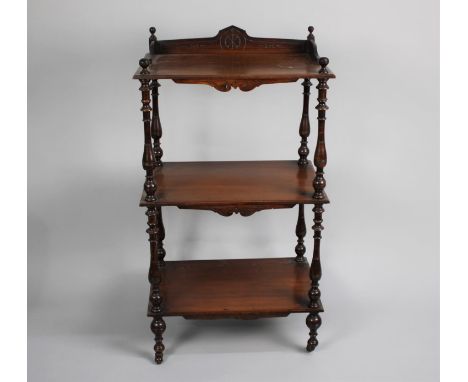 A Late Victorian Three Tier Rectangular Whatnot with Turned Supports and Galleried Top Shelf, 54cms Wide and 99cms High 