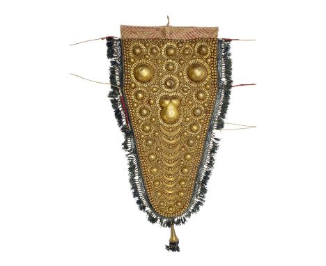 A gilt-copper elephant head ornament (nettipattam) South India, 19th Centuryof tapering form, the cotton ground decorated wit