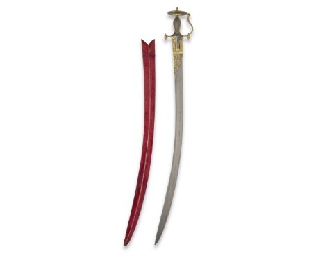 A gold koftgari steel sword (tulwar) with watered-steel hilt India, 19th Centurythe single-edged watered steel blade of curve