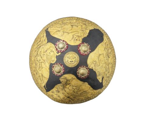 A painted leather shield (dhal) Mewar, North India, 19th Centuryof convex form, decorated in polychrome and gold paint with f