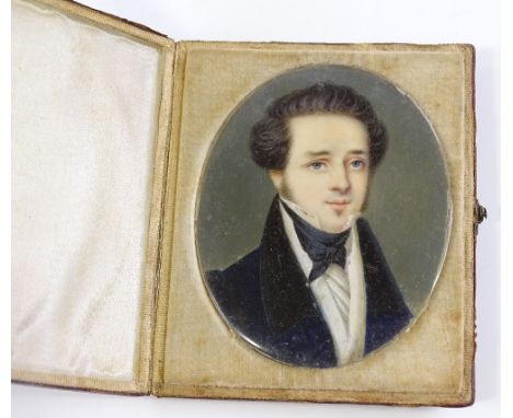 A 19th century miniature watercolour on ivory, head and shoulders portrait of a gentleman, unsigned, height 7.2cm, in origina