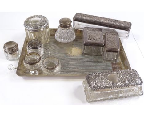 A rectangular engine turned silver tray, together with various silver-topped dressing table jars, tray length 28cm, 18oz weig