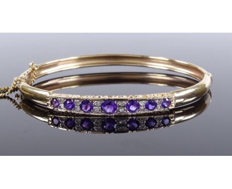 A 9ct gold graduated amethyst and diamond hinged bangle, with scripted bridge "with all my love forever and ever", internal d