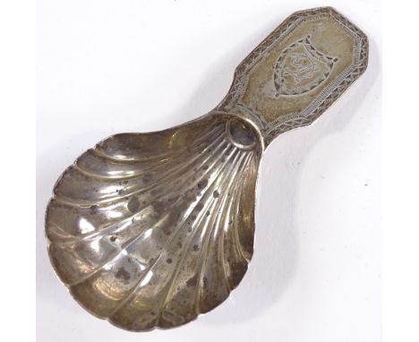 A George III silver caddy spoon, with shell design bowl and bright-cut handle, by William Burch, hallmarks London 1790, lengt