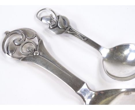 A Danish silver caddy spoon, length 11cm, by Berg &amp; Jensen, hallmarks 1950, together with a Danish stylised silver servin