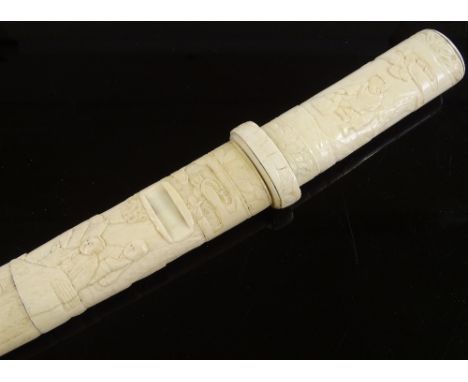 A Japanese early 20th century dagger, carved bone handle and scabbard, overall length 36cm 