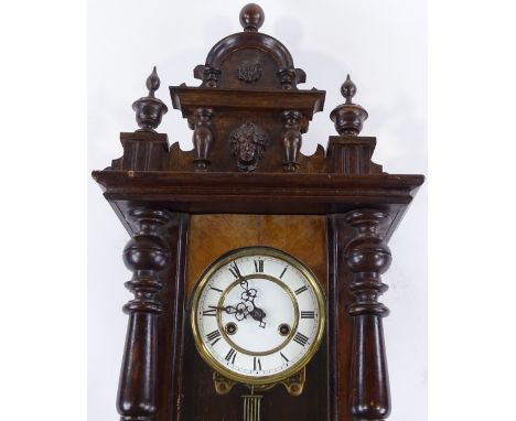 A 19th century Continental carved wood cased regulator wall clock, with enamel dial and 8-day striking movement, height 73cm 